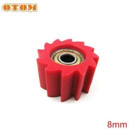 Ролик натяжителя цепи OTOM RACING зубчатый, красный OTM232393